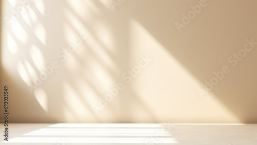 Minimalistic abstract gentle light beige background for product presentation with light andand intricate shadow from the window on wall.