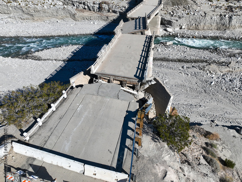 A Bridge that Collapsed due to a Tropical Storm and Run Off with Erosion over a River