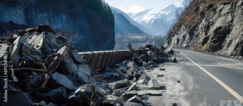 Mountainous areas experiencing rockfalls during early spring on a hazardous road.