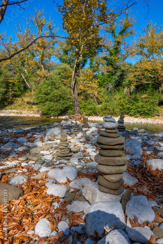 Pile of stones placed from smallest to largest one on top of the other, with different shapes and different colors,