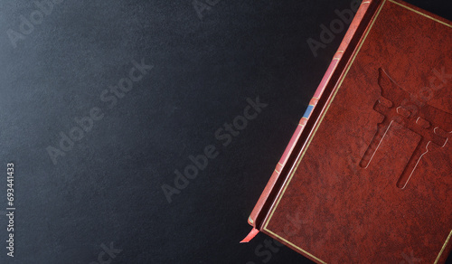 Background with sacred book with engraved shinto symbol top view