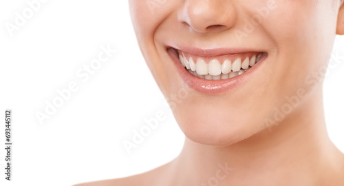 Happy woman, teeth and smile for dentist, mouth hygiene or dermatology against a white studio background. Closeup of female person for tooth whitening in dental, oral or gum care on mockup space
