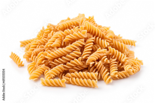 raw fusilli rotini, uncooked Italian pasta, isolated on white background, selective focus