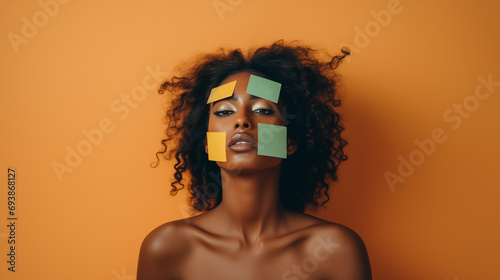 A young woman with paper stickers on her face. Concept of labels imposed by society.