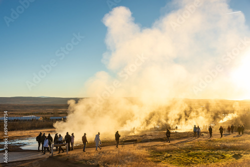  Stokkur geyser spectacular eruption in front of aa crowd of tourists, Iceland