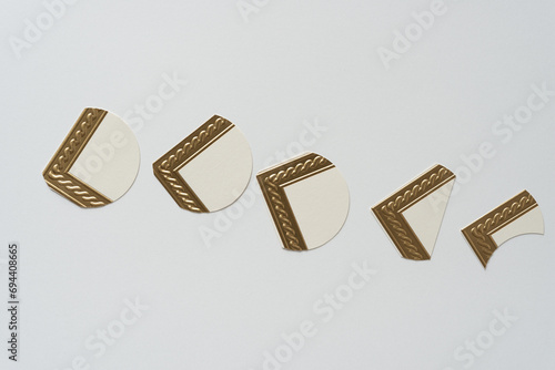row of decorative gold trim circles corners