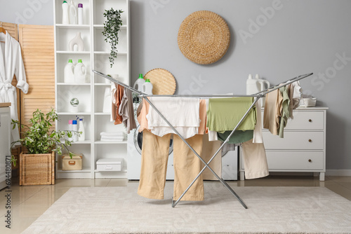 Dryer with clean clothes in laundry room