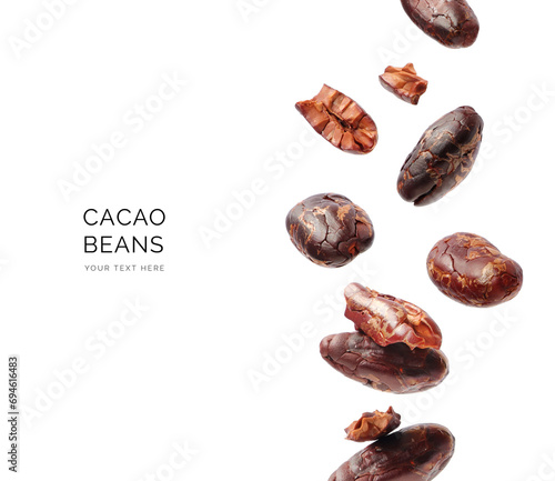 Creative concept made of cacao beans on the white background. Flat lay. Food concept. Macro concept. 