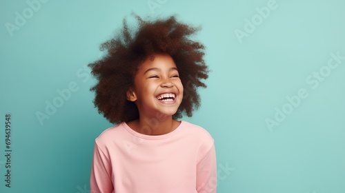 Laughing Black Girl isolated on Minimalist Background. DEIB, Diversity, Equity, Inclusion, Belonging 