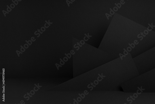 Luxury black stage mockup with abstract geometric pattern of angles, polygons and triangles as relief for presentation cosmetic products, goods, advertising, design in contemporary minimalist style.