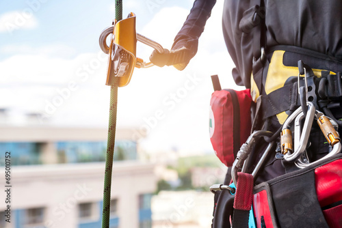Equipment of industrial mountaineering worker on roof