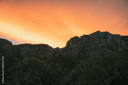 Orange Clouds Hang Over The Ridge In The Chisos Mountains of Big Bend