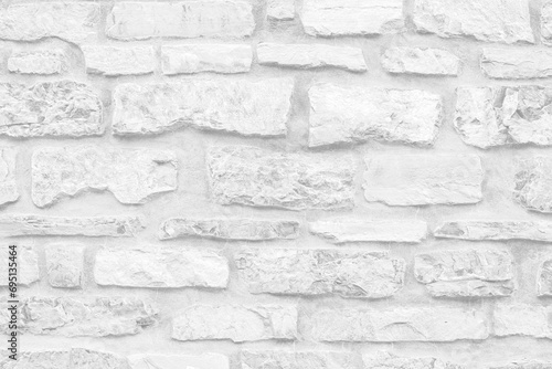 Abstract stone background - old weathered brick ancient wall, horizontal grunge white background, closeup