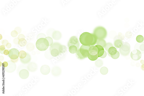 緑色と白色の玉ボケが重なる抽象的な背景