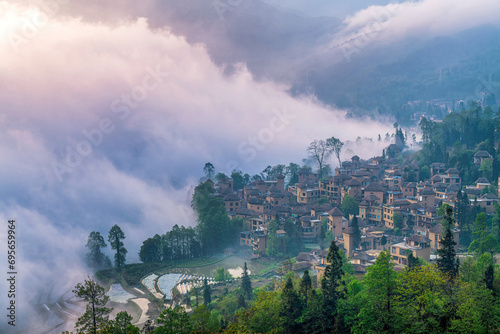 The cottage in the morning fog of Ailao Mountain, Yuanyang County, Honghe Prefecture, Yunnan Province, China.