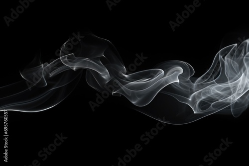 Smoke close up on a black background. Perfect for creating a mysterious and dramatic atmosphere
