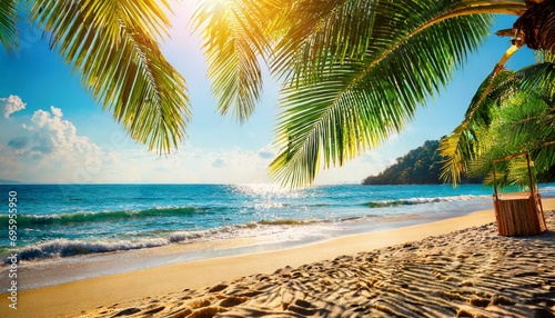 sunny tropical beach the leaves of palm trees tropical beach summer vacation and tropical beach background concept