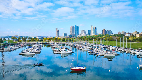 Aerial View of Bustling Marina with Sailboats and Urban Skyline, Milwaukee