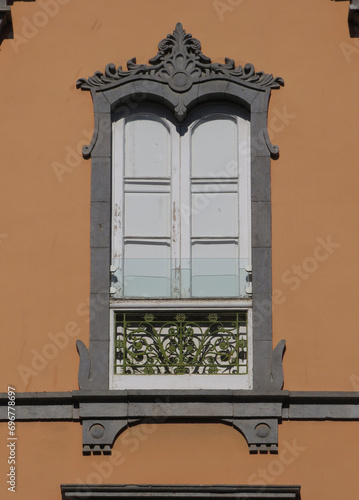 Historic facade with window in the Old Quarter of Vegueta. City center of Las Palmas. Gran Canaria Island. Spain. 