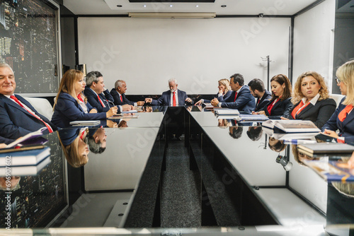 Successful Business Leaders Sharing Ideas in a Modern Office Conference Room