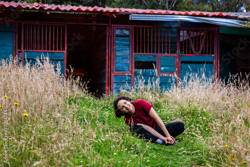 Young woman enjoying the nature of a beautiful paramo at the department of Cundinamarca in Colombia