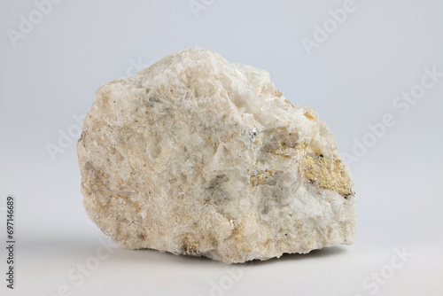 Albite is a white plagioclase feldspar mineral used in the manufacture of glass and ceramics