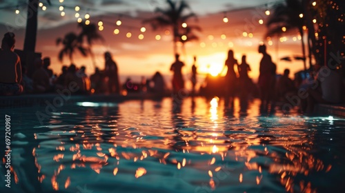 blurred view of people reveling in the festivities at a beach party by swimming pool