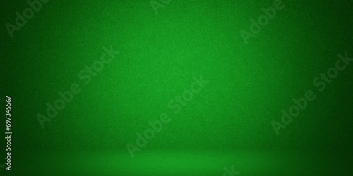 photo background green. textured wall rolling in the floor. studio photography background illuminated by the directed light Traditional painted canvas or muslin fabric cloth studio backdrop