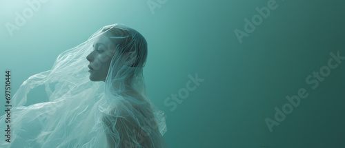 a woman trapped in transparent plastic bag resemble a jellyfish, The model's serene expression and graceful floating pose, with copy-space for text, plastic and ecology concept