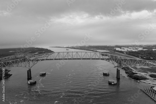 Aerial view of the Sabine Lake Causeway Bridge at Port Arthur Texas on an overcast day.