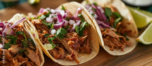 Tacos with homemade pork and garnishes.