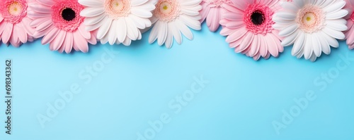 Spring flowers gerberas. Bouquet of gerberas flowers on pastel background. Valentine's Day, Easter, Birthday, Happy Women's Day, Mother's Day. Flat lay, top view, copy space for text
