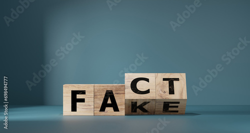 Flipping Wooden cube block for change fake to fact , news and social media concept.