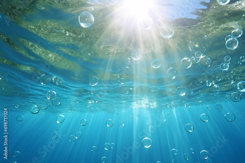 Submerged in the Mediterranean sea, bubbles rise towards the sun.