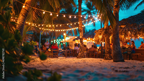 A tropical beach bar in the Caribbean with bokeh lights strung between palm trees as vacationers enjoy refreshing cocktails and live music 
