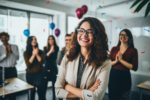 Woman Celebrates Her Promotion With Colleagues In The Office