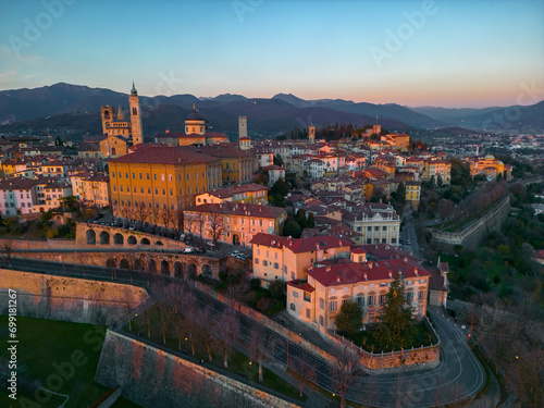 Bergamo, Italy. Scenic aerial view of the old town city center Citta Alta. Landscape of the historical buildings during the sunset