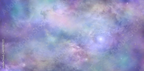 Beautiful colorful celestial cloudscape background banner - heavenly concept blue pink purple lilac ethereal deep space sky depicting the heavens above ideal for a spiritual theme 