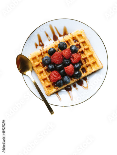 waffles with berries isolated on white background