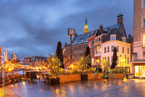 Bridge Visbrug and canal Oude Rijn in Christmas illumination, Dutch city of Leiden, Netherlands