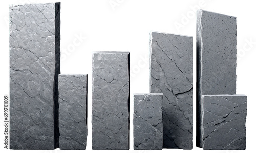 Vertically standing stone blocks of gray color of different shapes.