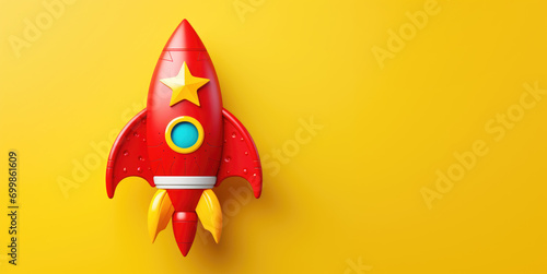 Red Rocket Toy on Yellow Background with Copy Space