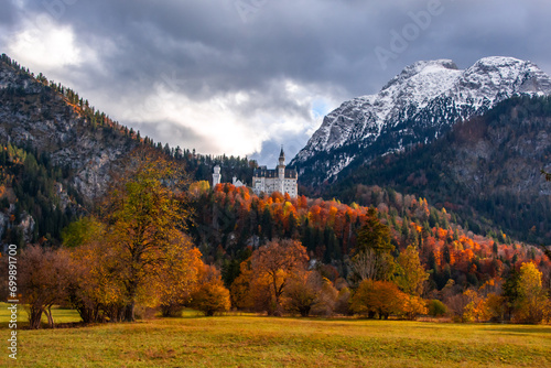 Fall colors around Neuschwanstein with snow on the Alps