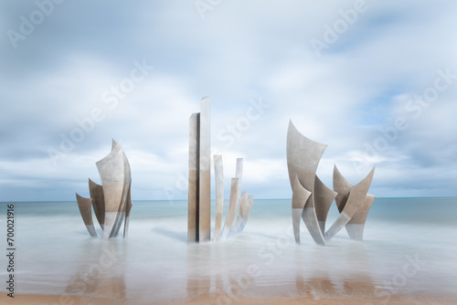 Saint-Laurent-sur-Mer, France. The monumental sculpture "Les Braves" by Anilore Banon was erected on Omaha Beach in 2004 for the 60th anniversary of the WWII Normandy landings.