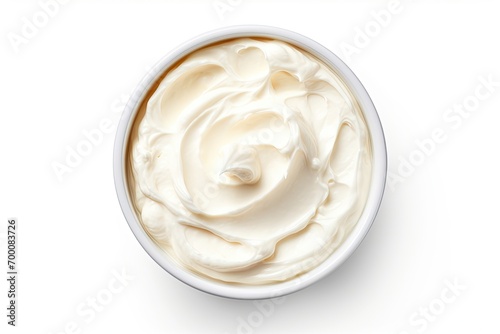 Cream cheese in a bowl white background top view