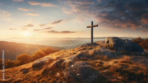 Holy christian religious cross at sunrise on top of hill crucifix