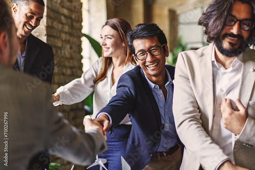 Multicultural Business Professionals Celebrating Success