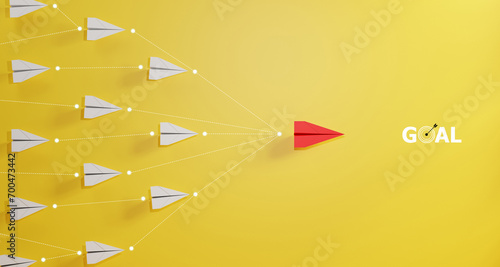 Leadership concept, red leader plane leading white plane, on yellow background.