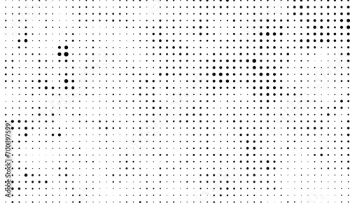 abstract background with dots pattern, a black and white dotted background with white dots, grunge dot effect