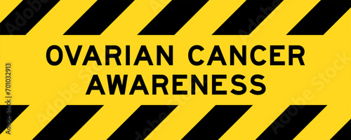 Yellow and black color with line striped label banner with word ovarian cancer awareness